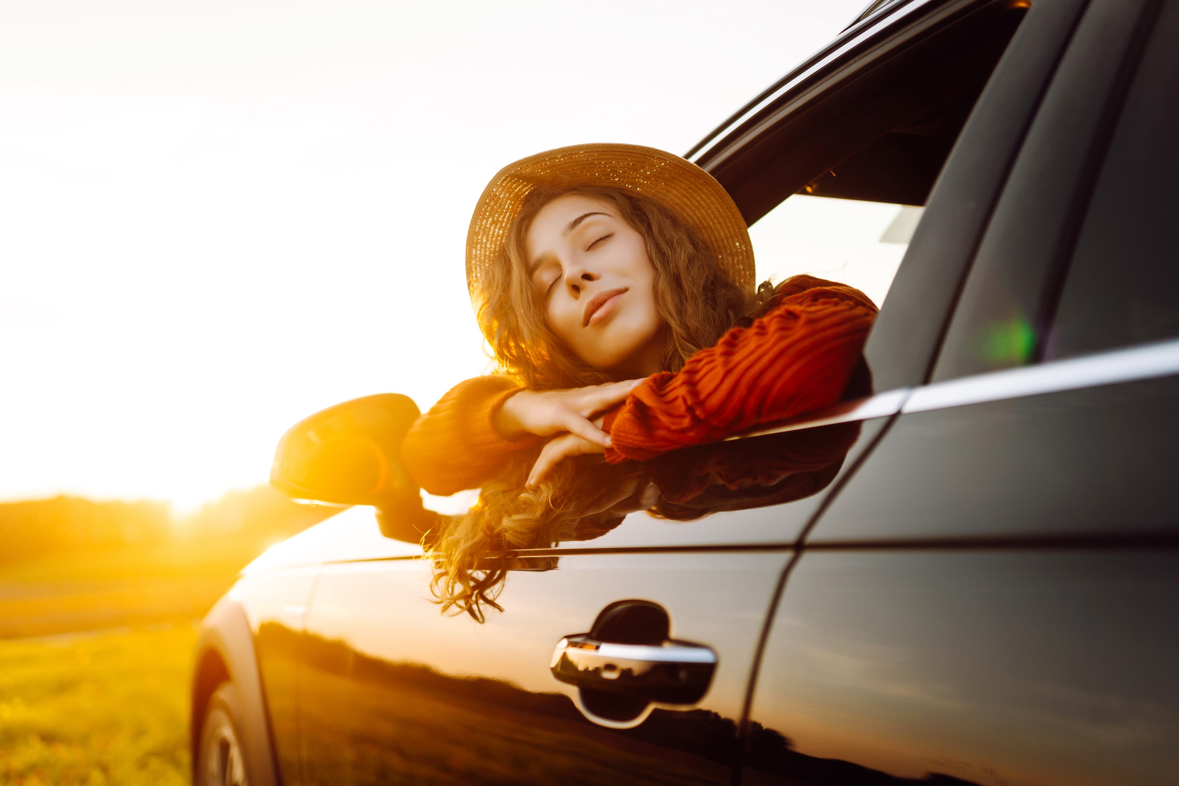 A modern vehicle parked on a calm urban street, reflecting premium care as part of everyday city life